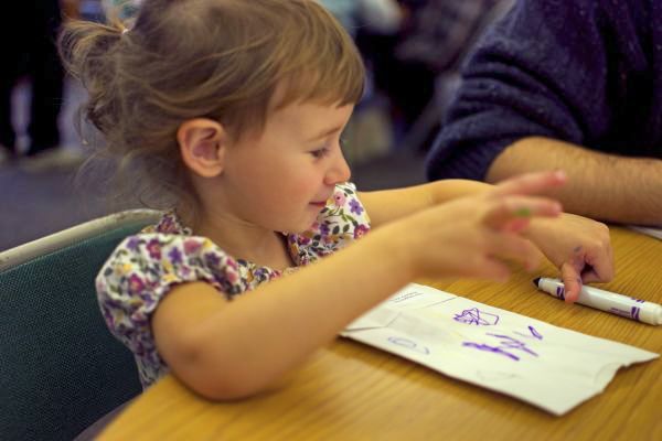 young church member drawing pictures